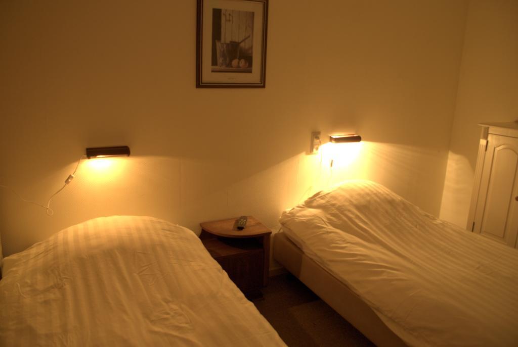 Hotel "De Steenen Man" Zurich Bilik gambar
