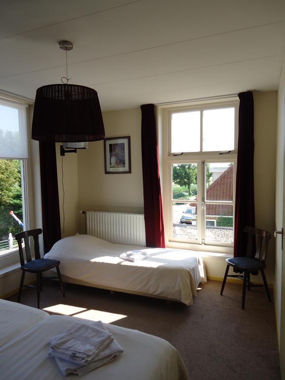 Hotel "De Steenen Man" Zurich Bilik gambar